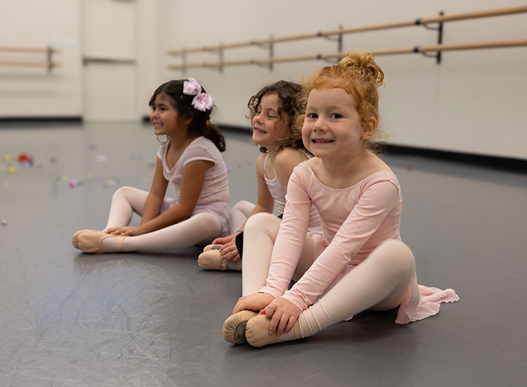 Small dancers stretching