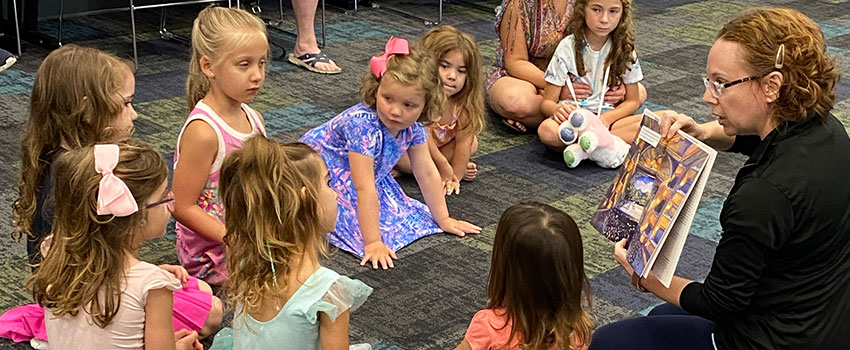 Children listening to a story at the library.